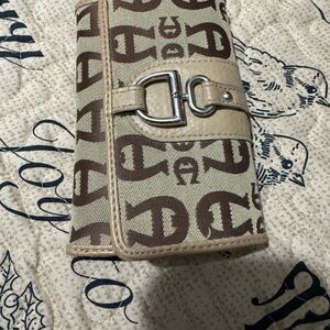 Etienne Aigner Women’s Brown Signature Cloth Trifold Wallet, Silver Hardware